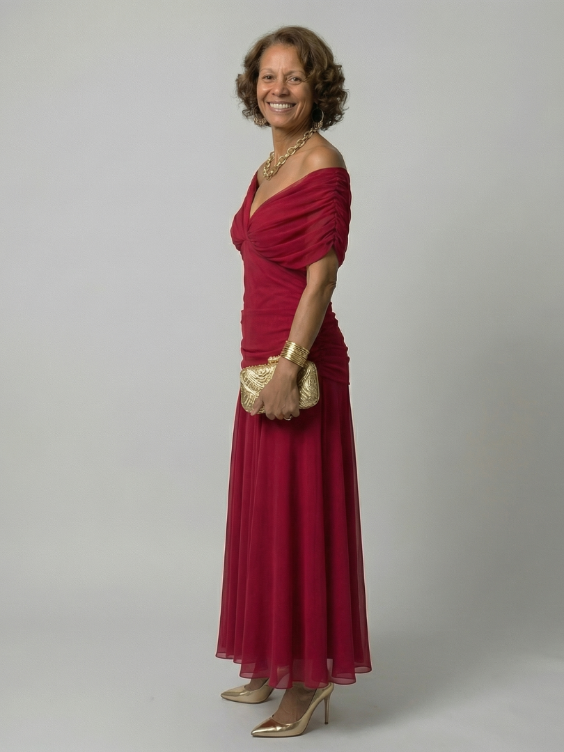 Woman wearing a purple watercolor floral mesh maxi dress with draped crossover neckline and ruched waist - view 10