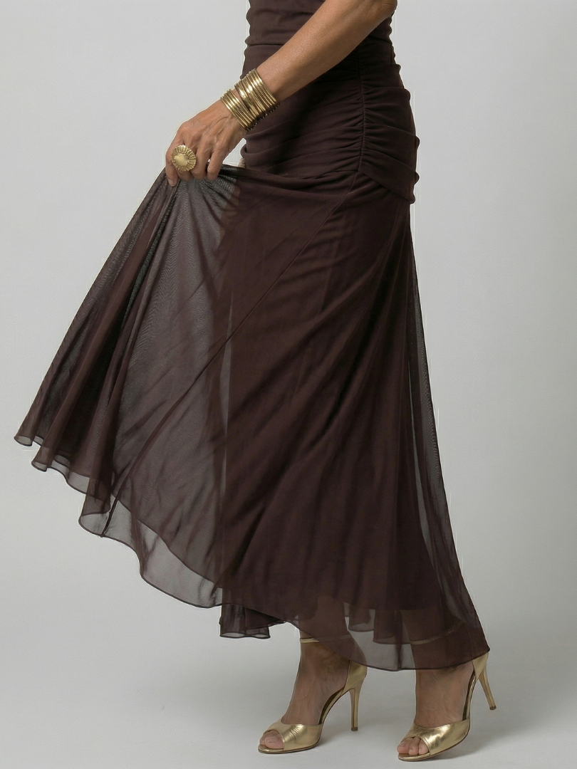 Woman wearing a purple watercolor floral mesh maxi dress with draped crossover neckline and ruched waist - view 16