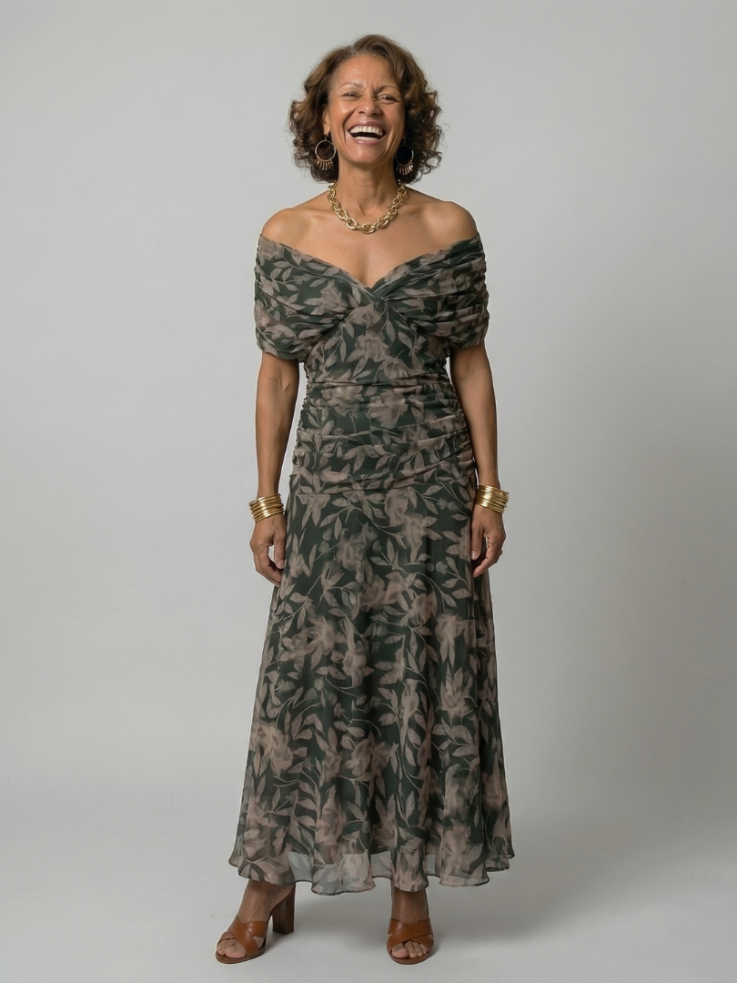 Woman wearing a purple watercolor floral mesh maxi dress with draped crossover neckline and ruched waist - view 5