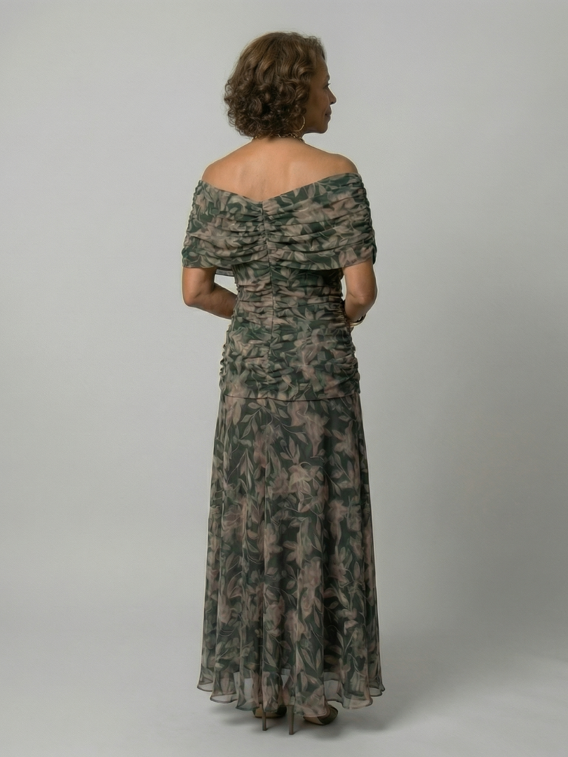 Woman wearing a purple watercolor floral mesh maxi dress with draped crossover neckline and ruched waist - view 8