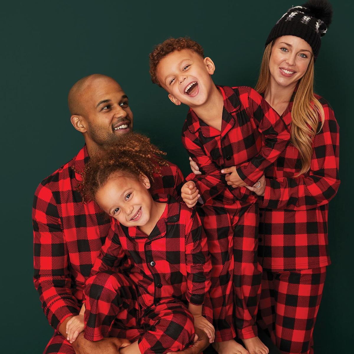 Matching red and black buffalo plaid family Christmas pajamas