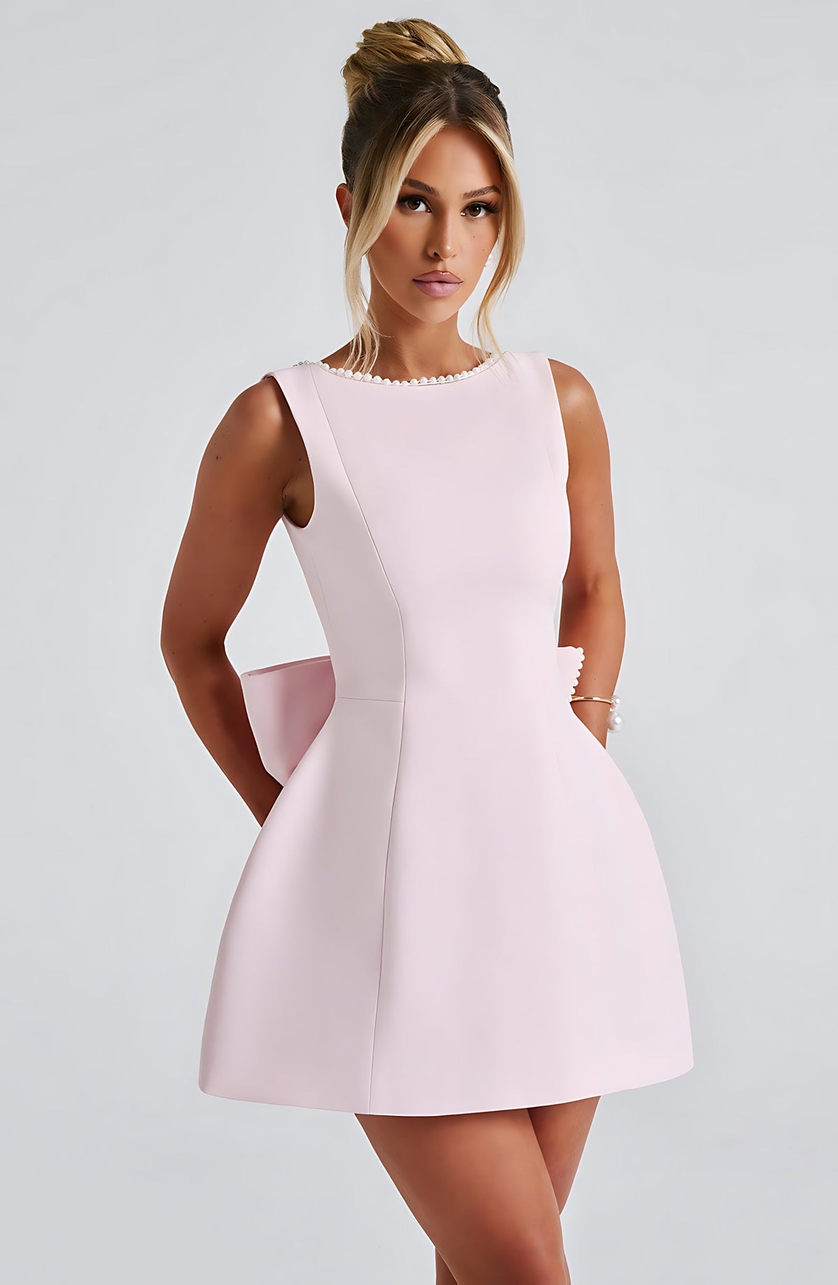 Sleeveless A-line cocktail mini dress with pearl-effect trim and oversized back bow - view 3