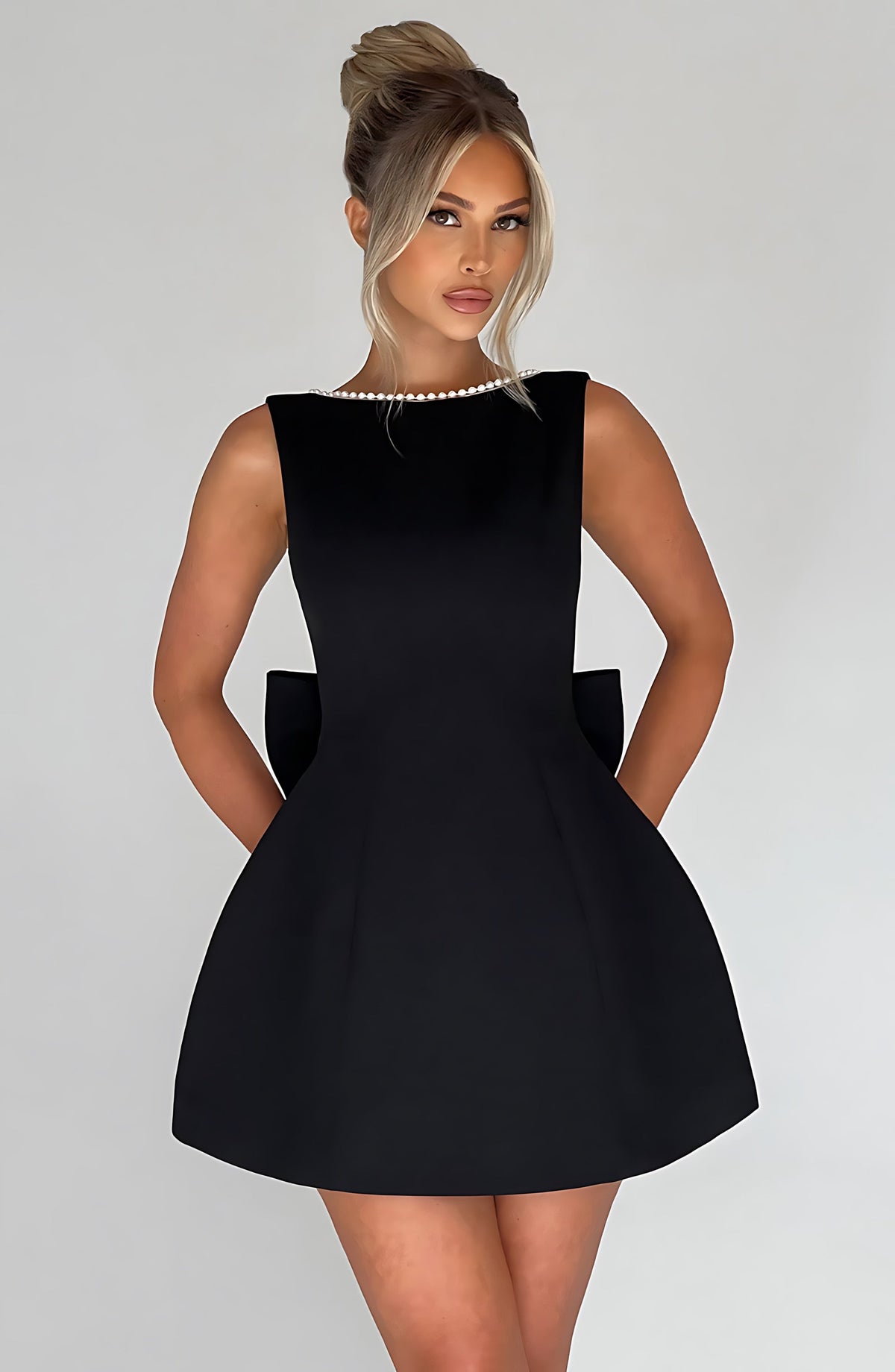 Sleeveless A-line cocktail mini dress with pearl-effect trim and oversized back bow - view 5