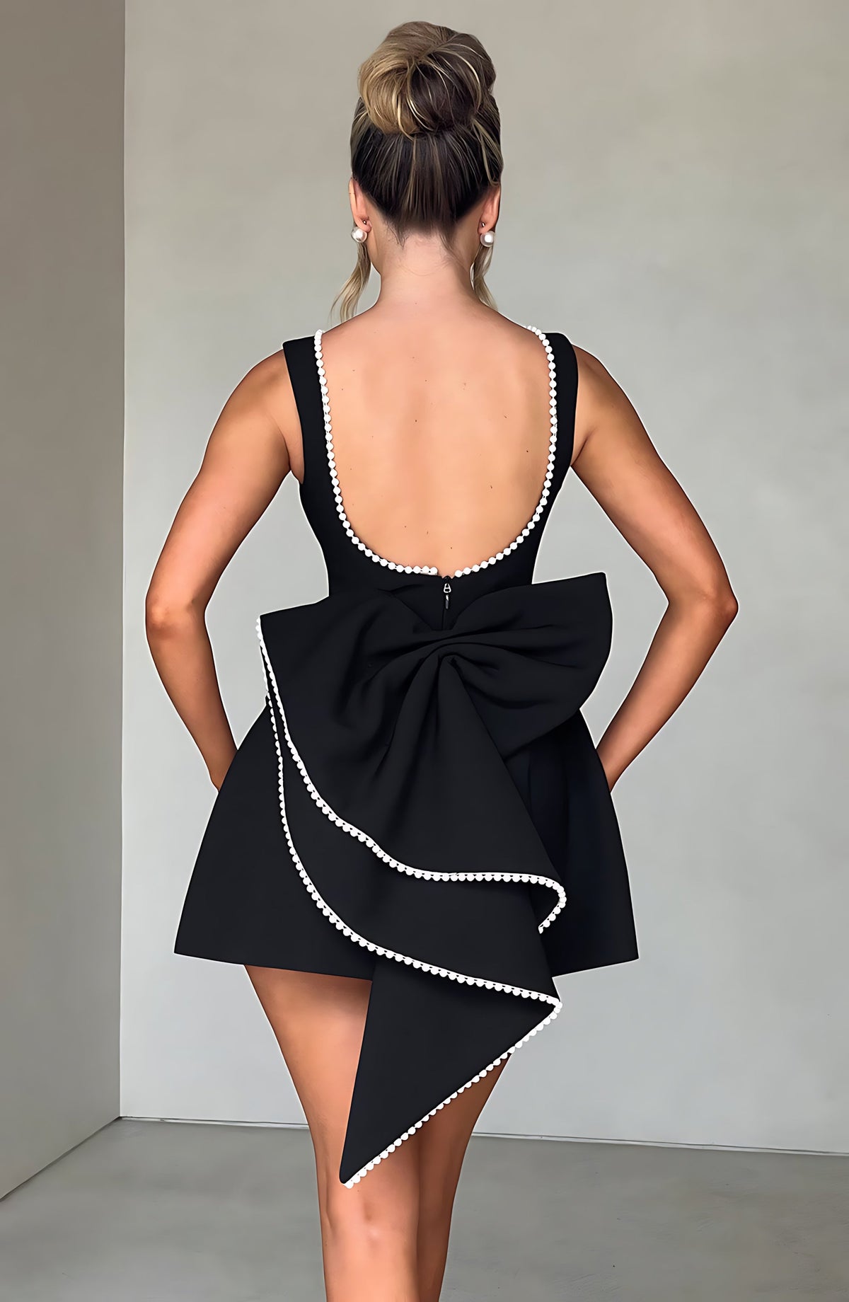 Sleeveless A-line cocktail mini dress with pearl-effect trim and oversized back bow - view 7