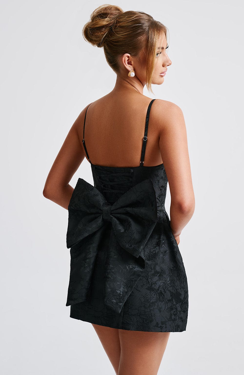 Little black corset mini dress in floral jacquard with lace-up back, statement bow and bubble skirt - view 5