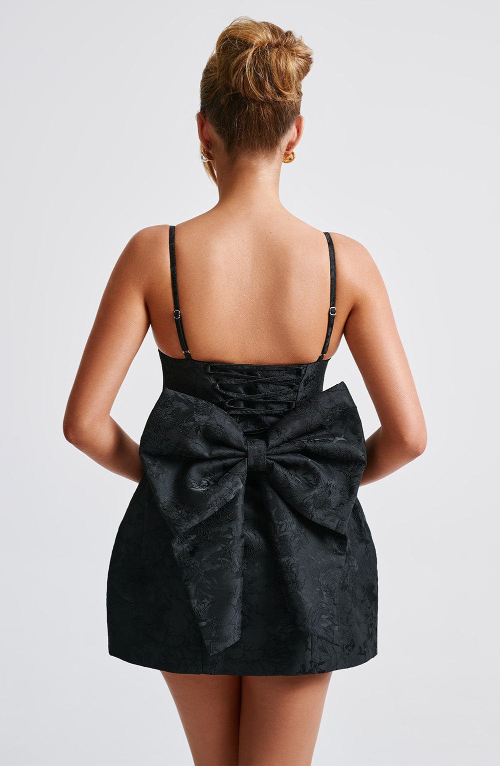 Little black corset mini dress in floral jacquard with lace-up back, statement bow and bubble skirt - view 6