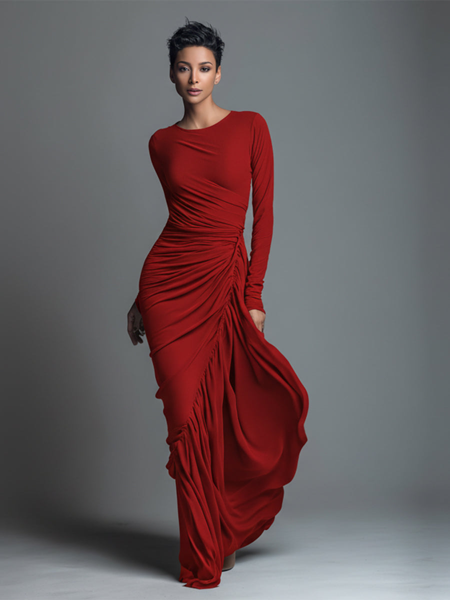 Woman wearing a black long sleeve ruched maxi dress with a draped skirt - view 7