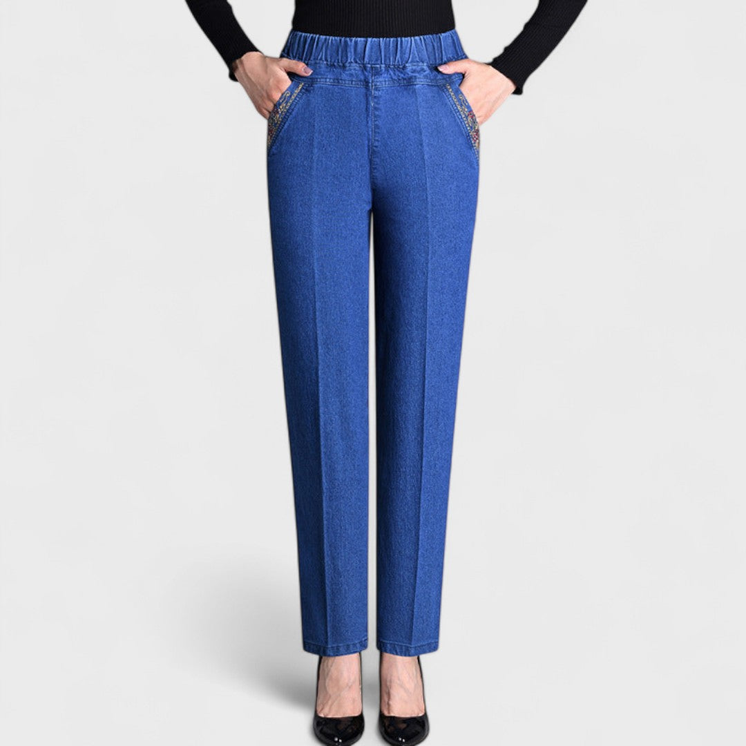 Women's elastic waist straight leg jeans with embroidered side pocket trim and pressed front crease - view 4