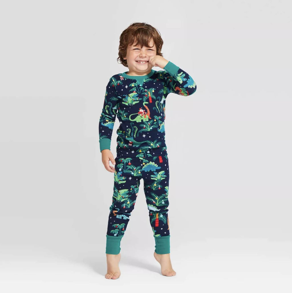 Matching family Christmas pajamas with dinosaur print on navy and teal ribbed cuffs - view 3