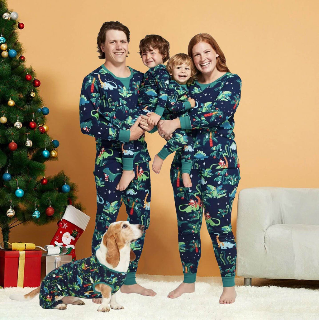 Matching family Christmas pajamas with dinosaur print on navy and teal ribbed cuffs - view 9