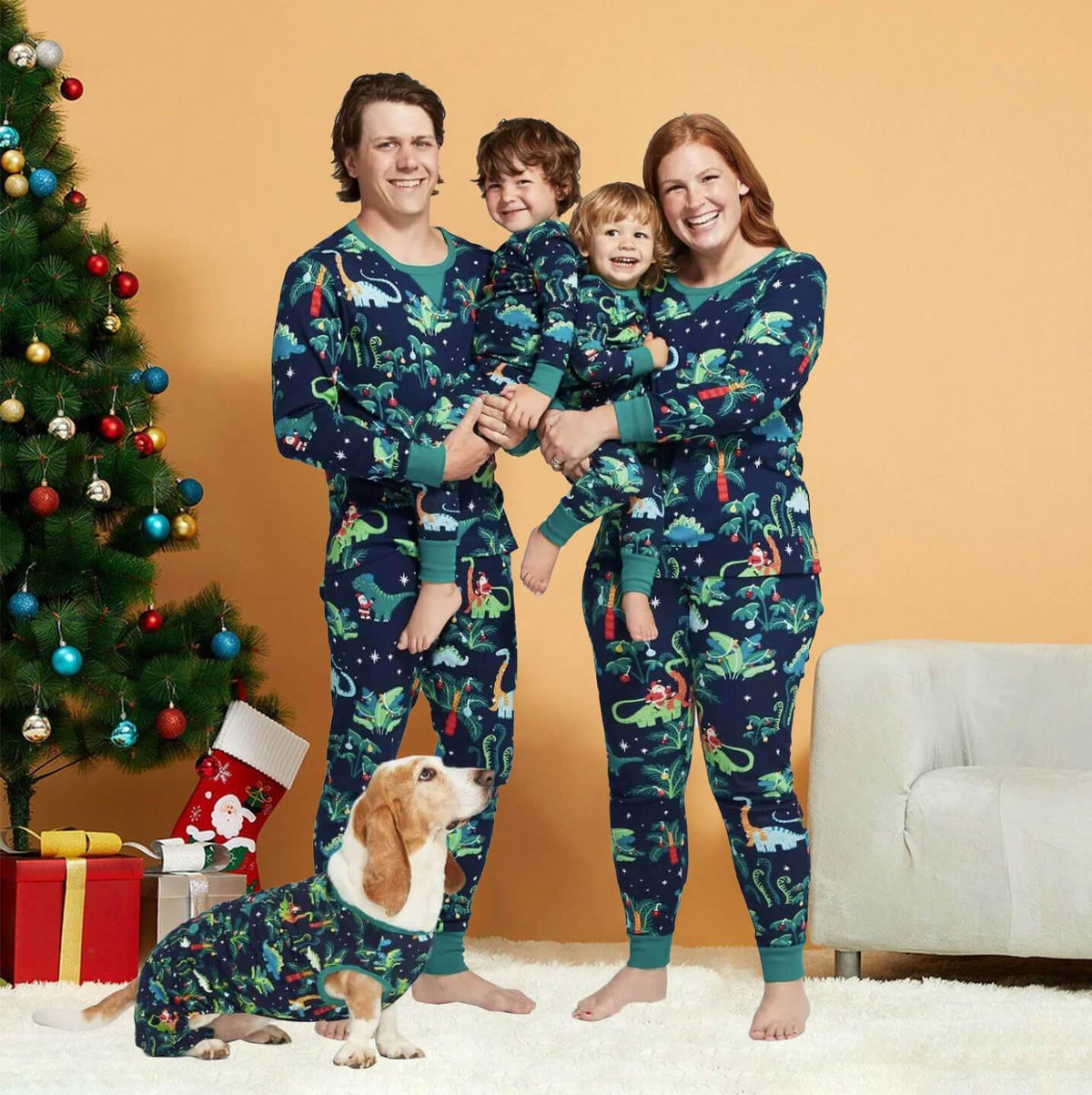 Matching family Christmas pajamas with dinosaur print on navy and teal ribbed cuffs - view 9