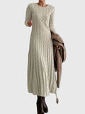 Cable knit crew neck sweater dress with long sleeves and flared skirt