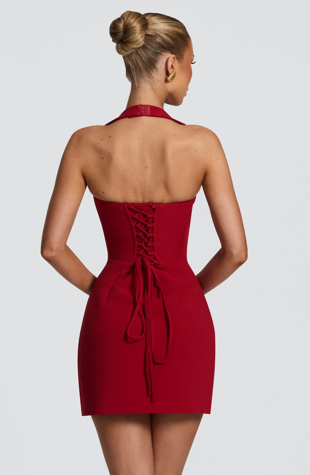 Formal fitted mini dress with halter strap and corset lace-up back - view 2