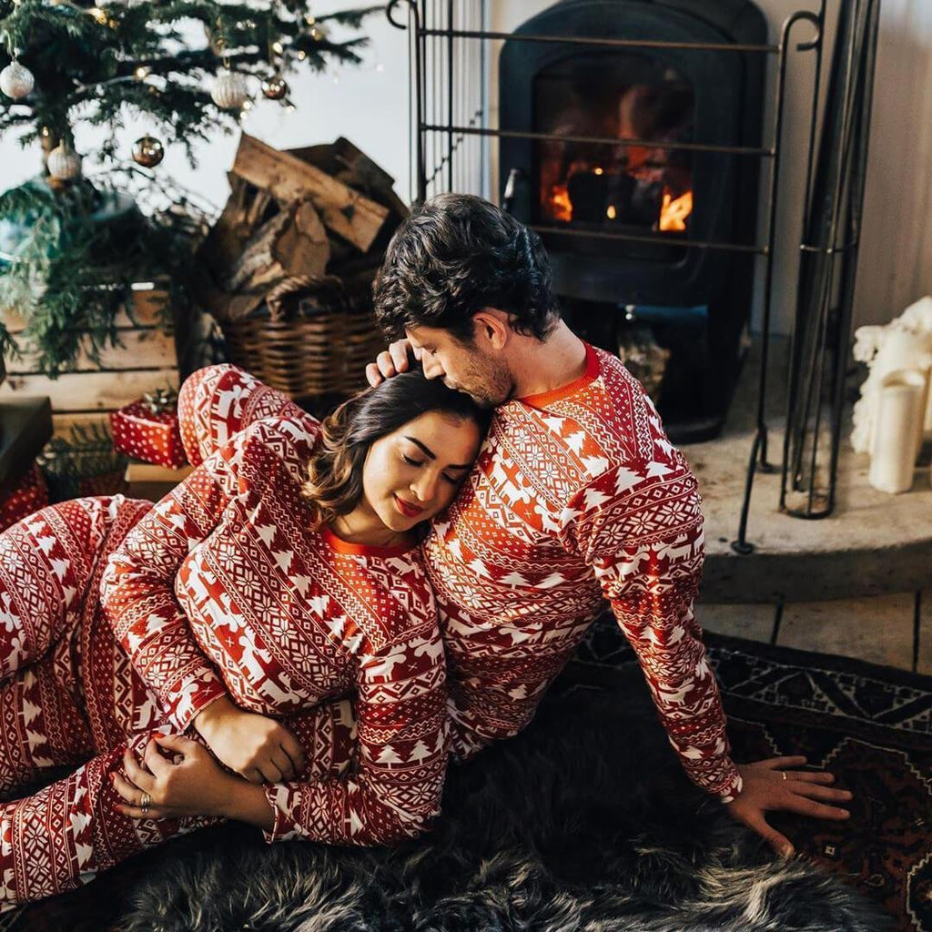 Matching family Christmas pajamas in red and white Fair Isle print with reindeer and snowflakes - view 6
