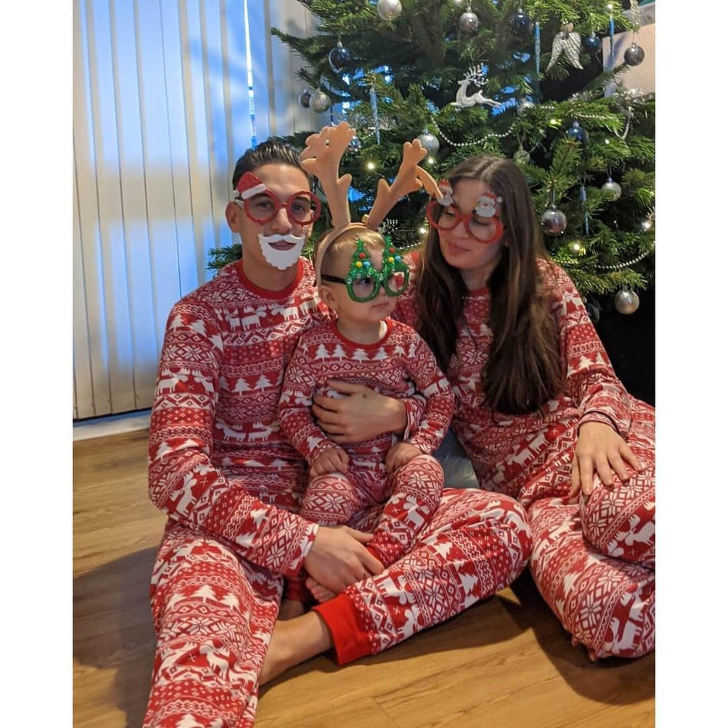 Matching family Christmas pajamas in red and white Fair Isle print with reindeer and snowflakes - view 7