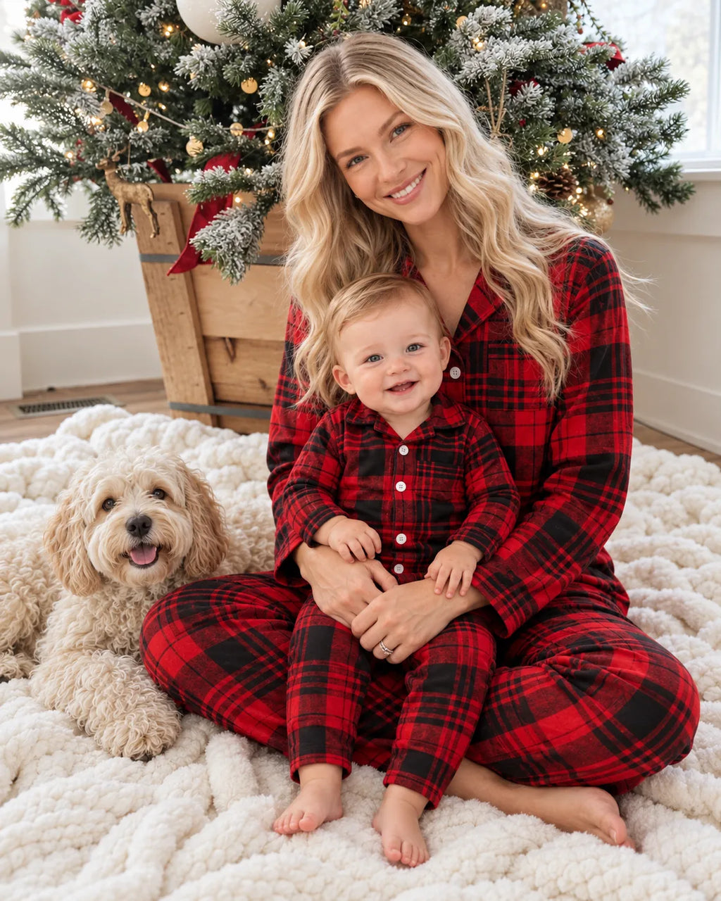 Family wearing matching red and black plaid flannel Christmas pajamas