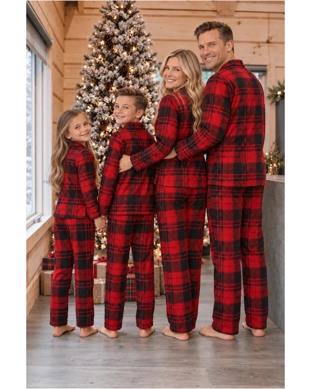 Family wearing matching red and black plaid flannel Christmas pajamas - view 12