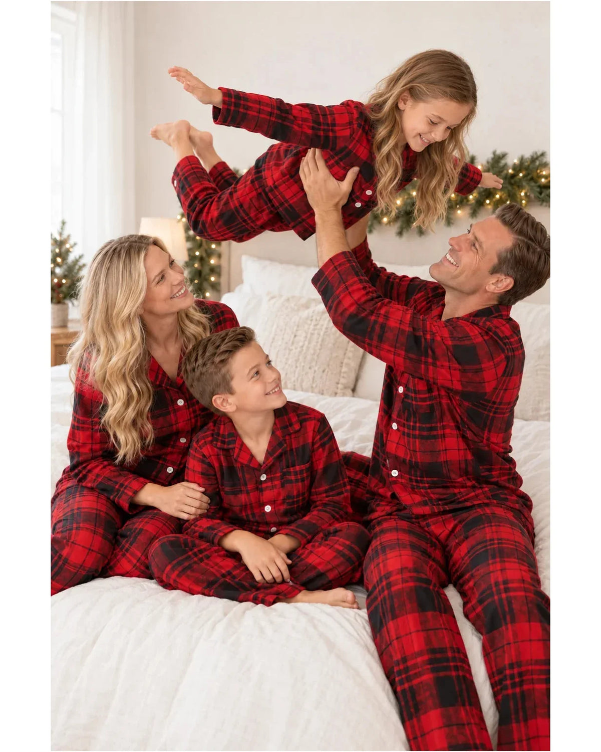 Family wearing matching red and black plaid flannel Christmas pajamas - view 4