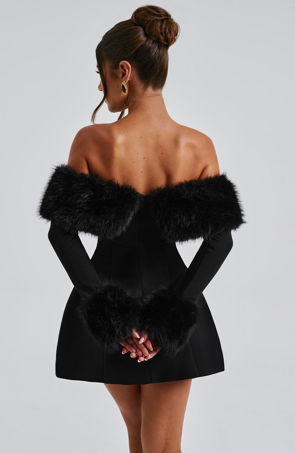 Long sleeve black mini dress with faux fur trim neckline and cuffs - view 8