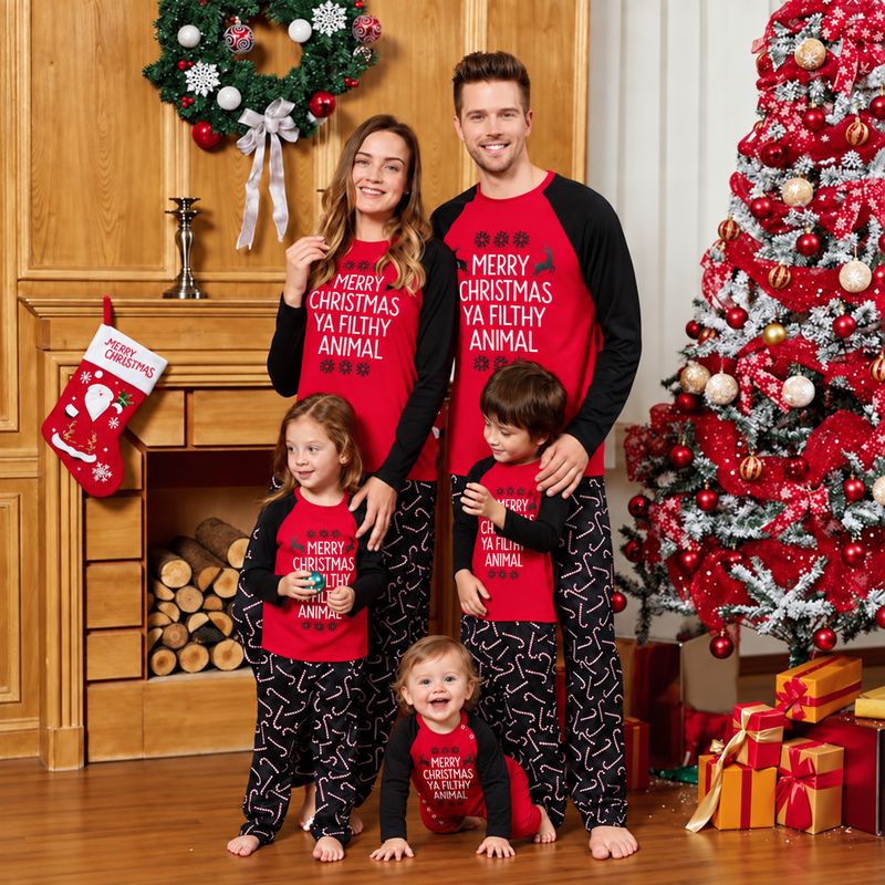 Holiday pajamas family set with red raglan slogan tee and black candy cane pajama pants