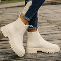 Women's Chelsea ankle boots in leather-look finish with lug sole and pull loops