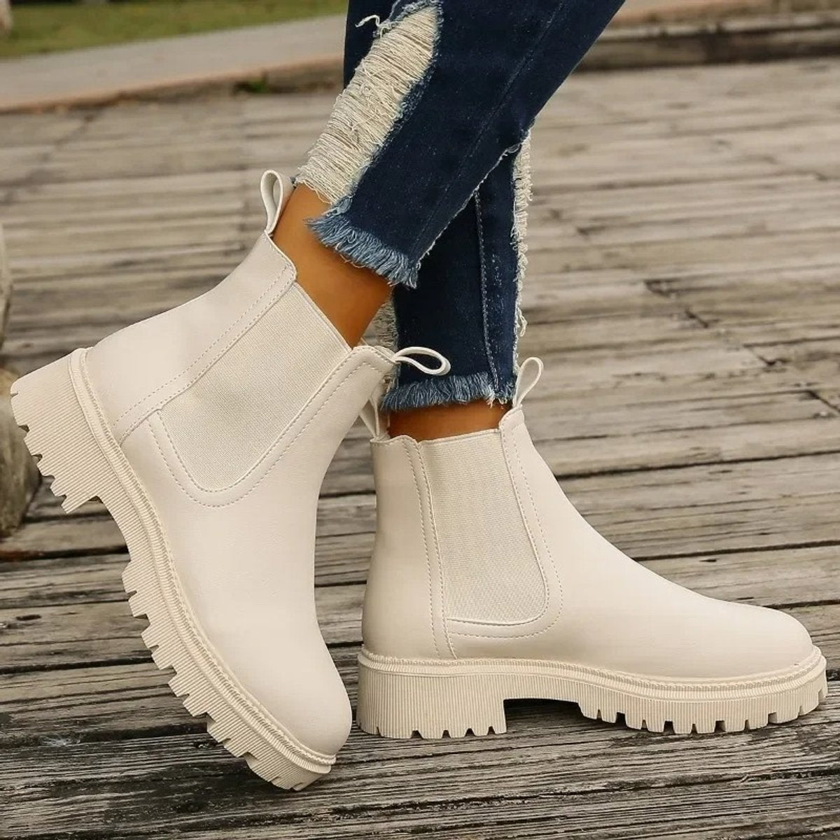 Women's Chelsea ankle boots in leather-look finish with lug sole and pull loops