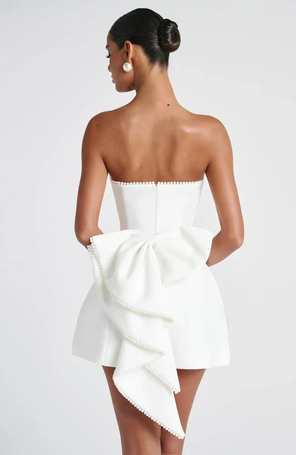Formal strapless mini dress with pearl-edged sculptural bow at the back - view 11