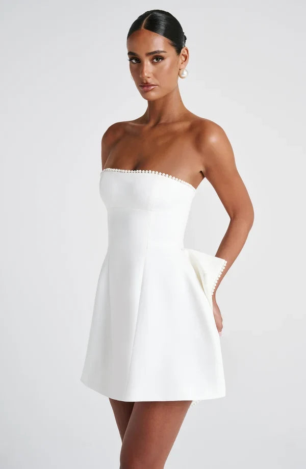 Formal strapless mini dress with pearl-edged sculptural bow at the back - view 12