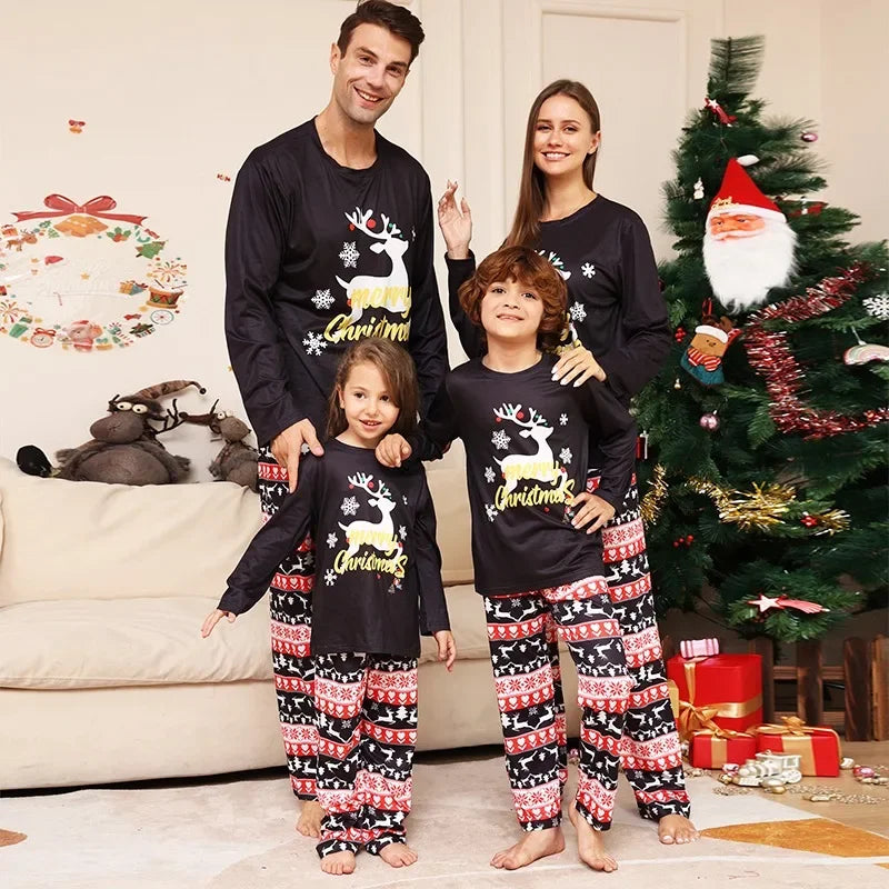 Black reindeer print Christmas pajama set with red white and black patterned pants