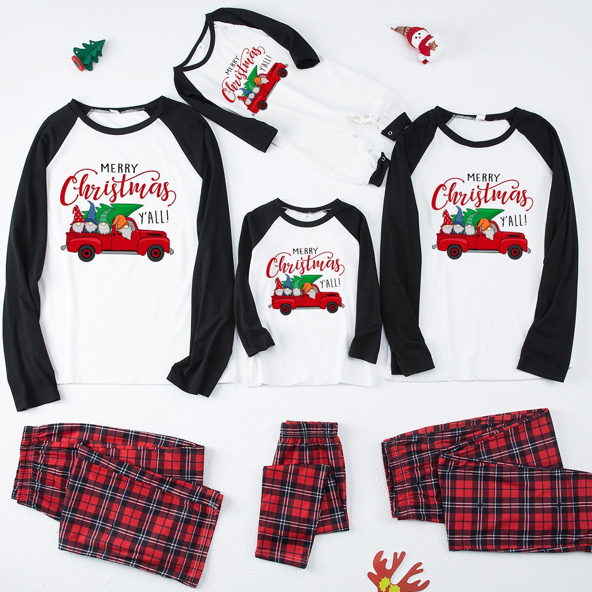 Matching family Christmas pajamas with red truck graphic raglan top and red plaid pants - view 2
