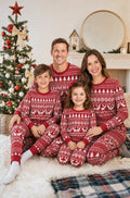 Matching family Christmas pajamas in red and white Fair Isle reindeer print