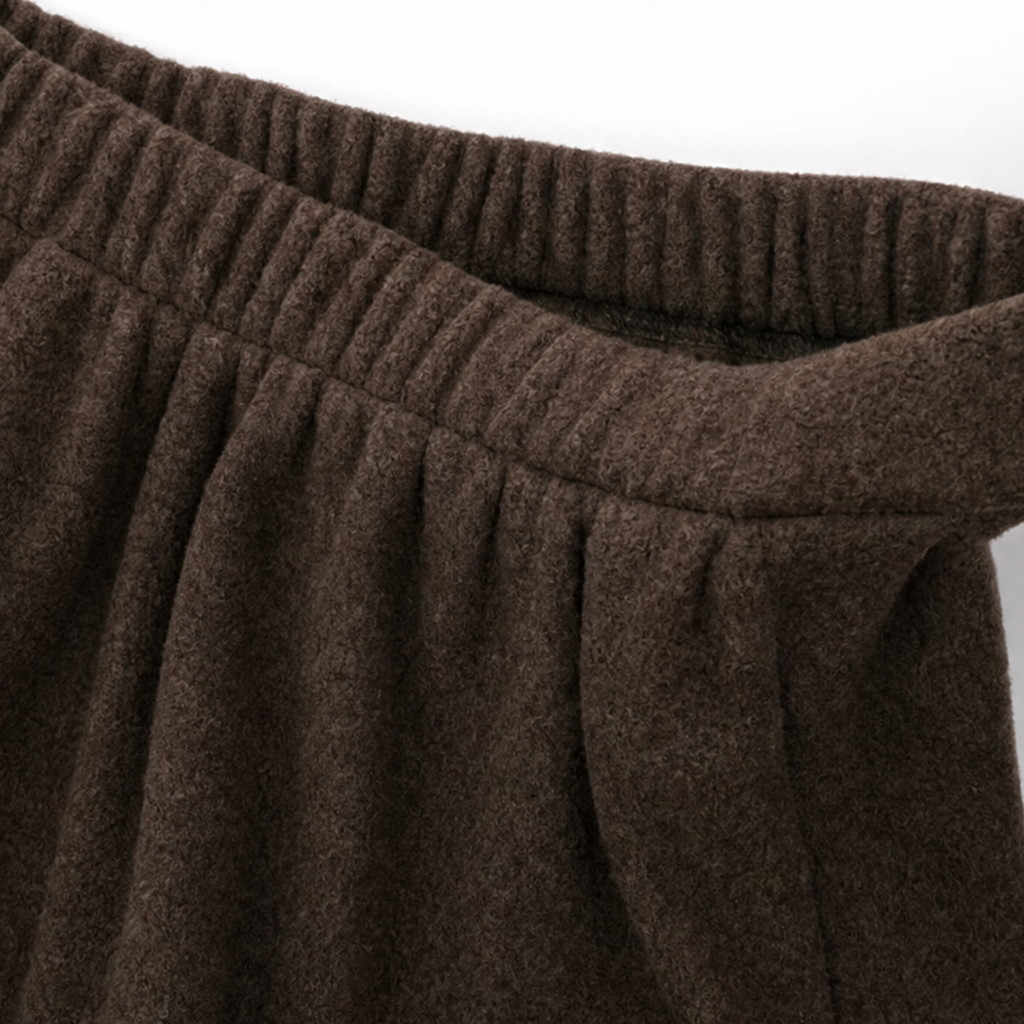 Woman wearing a brown turtleneck sweater and matching maxi skirt set - view 10