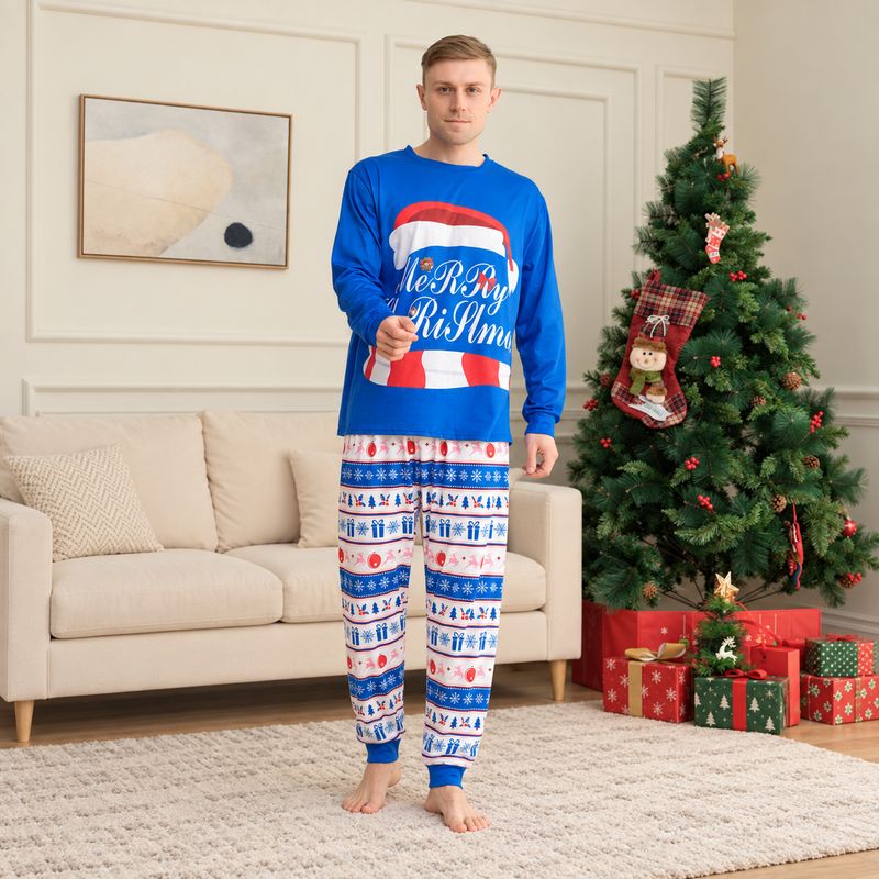 Matching holiday pajama set with blue Merry Christmas top and festive print pants - view 3