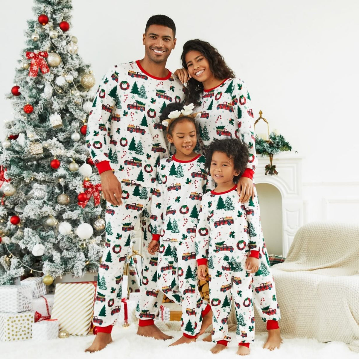 Family matching Christmas pajamas with plaid truck, tree and wreath print and red cuffs - view 4
