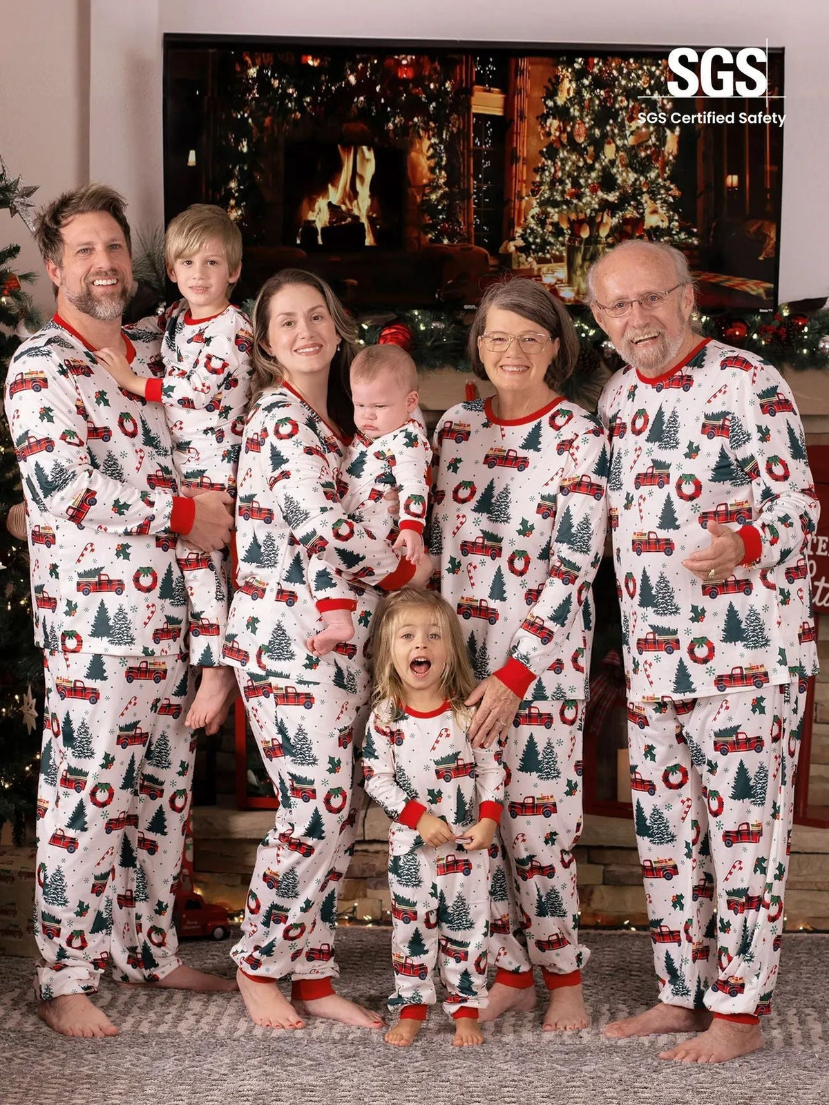 Family matching Christmas pajamas with plaid truck, tree and wreath print and red cuffs - view 6