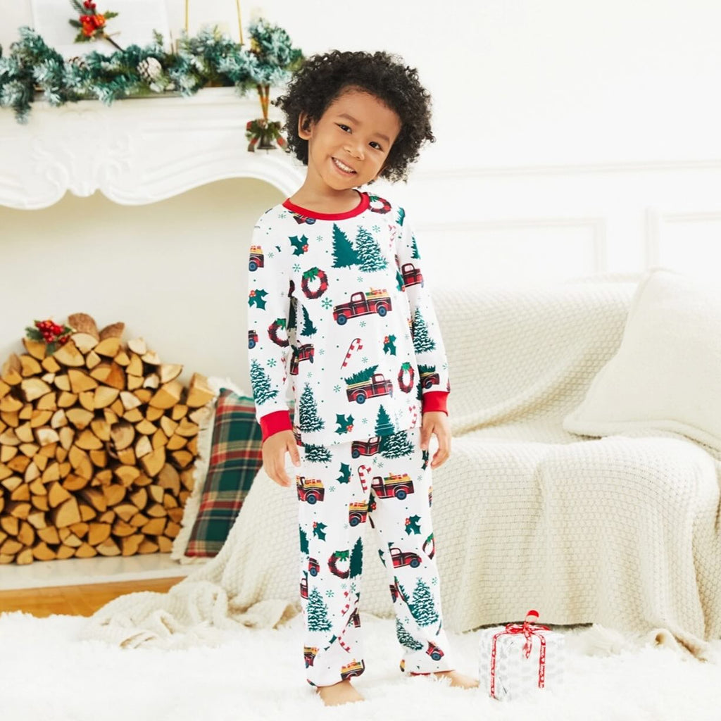 Family matching Christmas pajamas with plaid truck, tree and wreath print and red cuffs - view 8