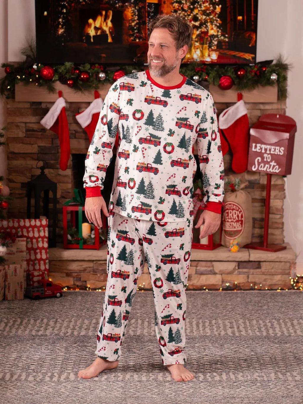 Family matching Christmas pajamas with plaid truck, tree and wreath print and red cuffs - view 9