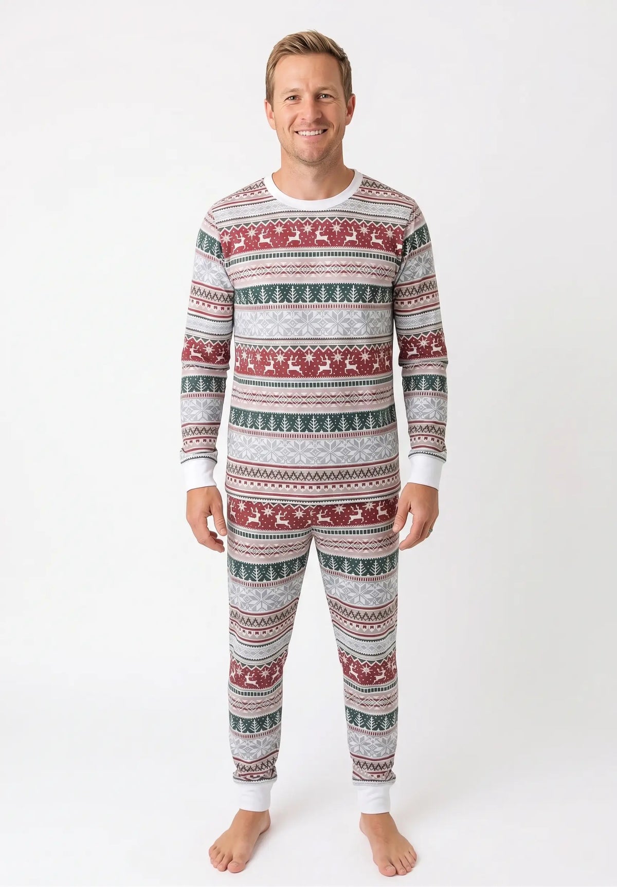 Family wearing matching Fair Isle Christmas pajamas with reindeer print and white cuffs - view 8