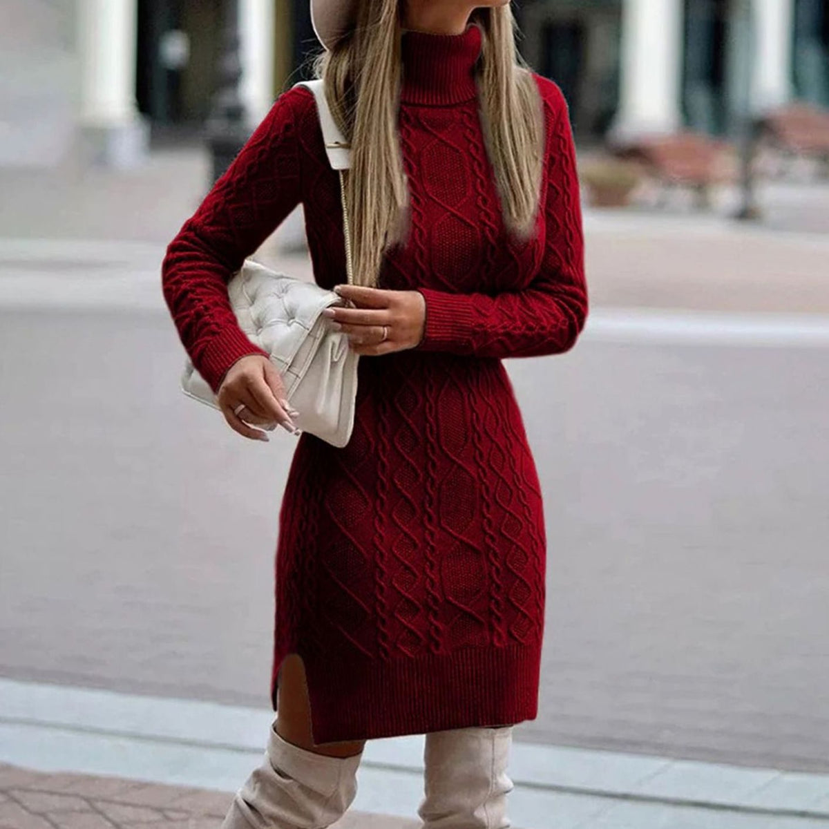 Cable knit turtleneck sweater dress with long sleeves and side slit hem