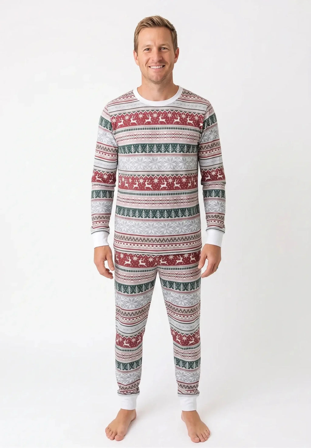 Family wearing matching Fair Isle Christmas pajamas with reindeer and snowflake print and white cuffs - view 8