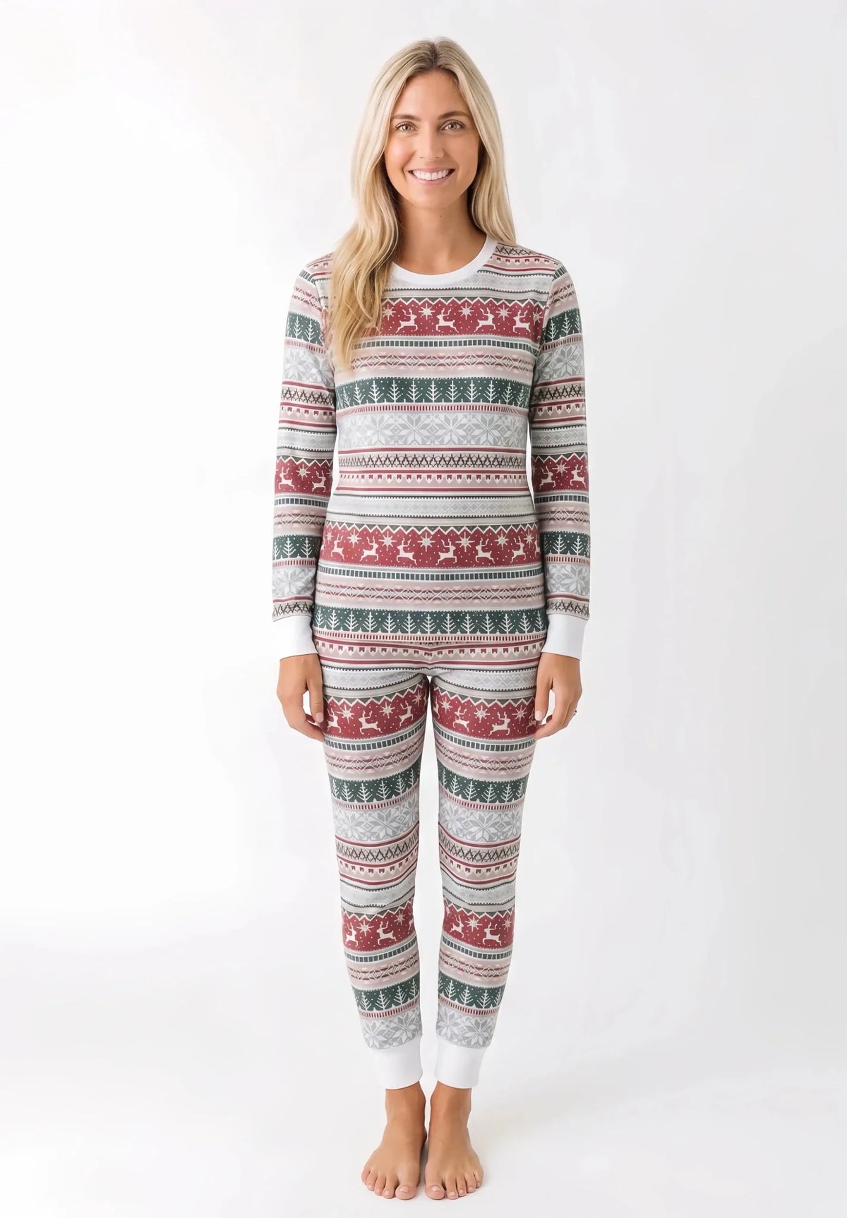 Family wearing matching Fair Isle Christmas pajamas with reindeer and snowflake print and white cuffs - view 9