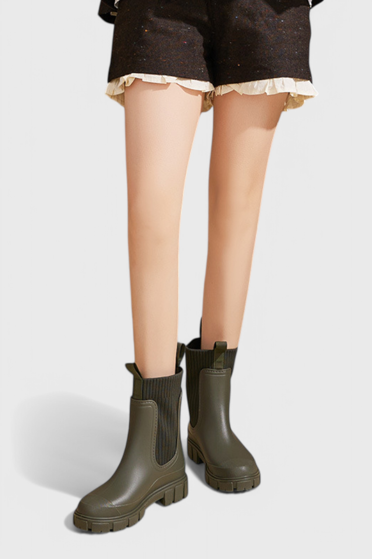 Lug sole Chelsea boots for women with tall ribbed knit collar and pull tabs - view 11