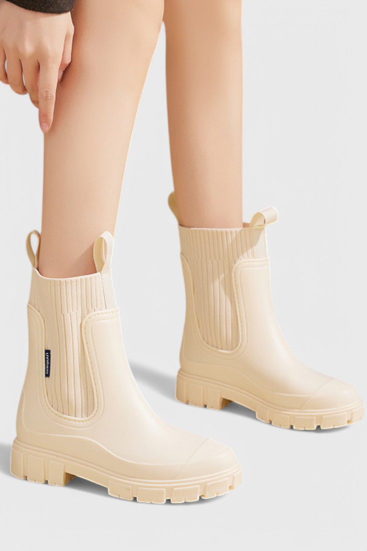 Lug sole Chelsea boots for women with tall ribbed knit collar and pull tabs - view 6