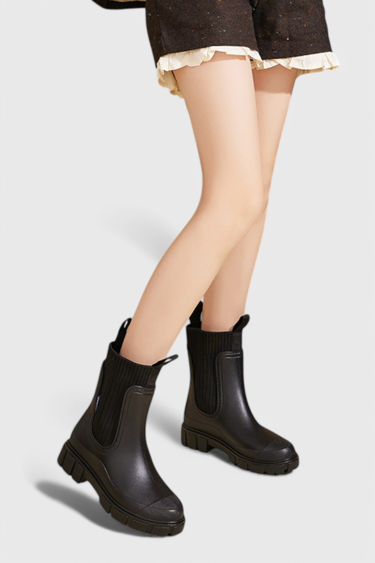 Lug sole Chelsea boots for women with tall ribbed knit collar and pull tabs - view 8