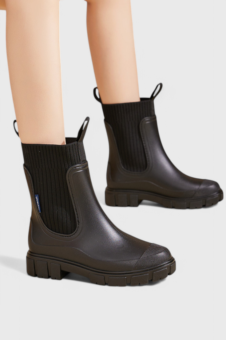Lug sole Chelsea boots for women with tall ribbed knit collar and pull tabs - view 9