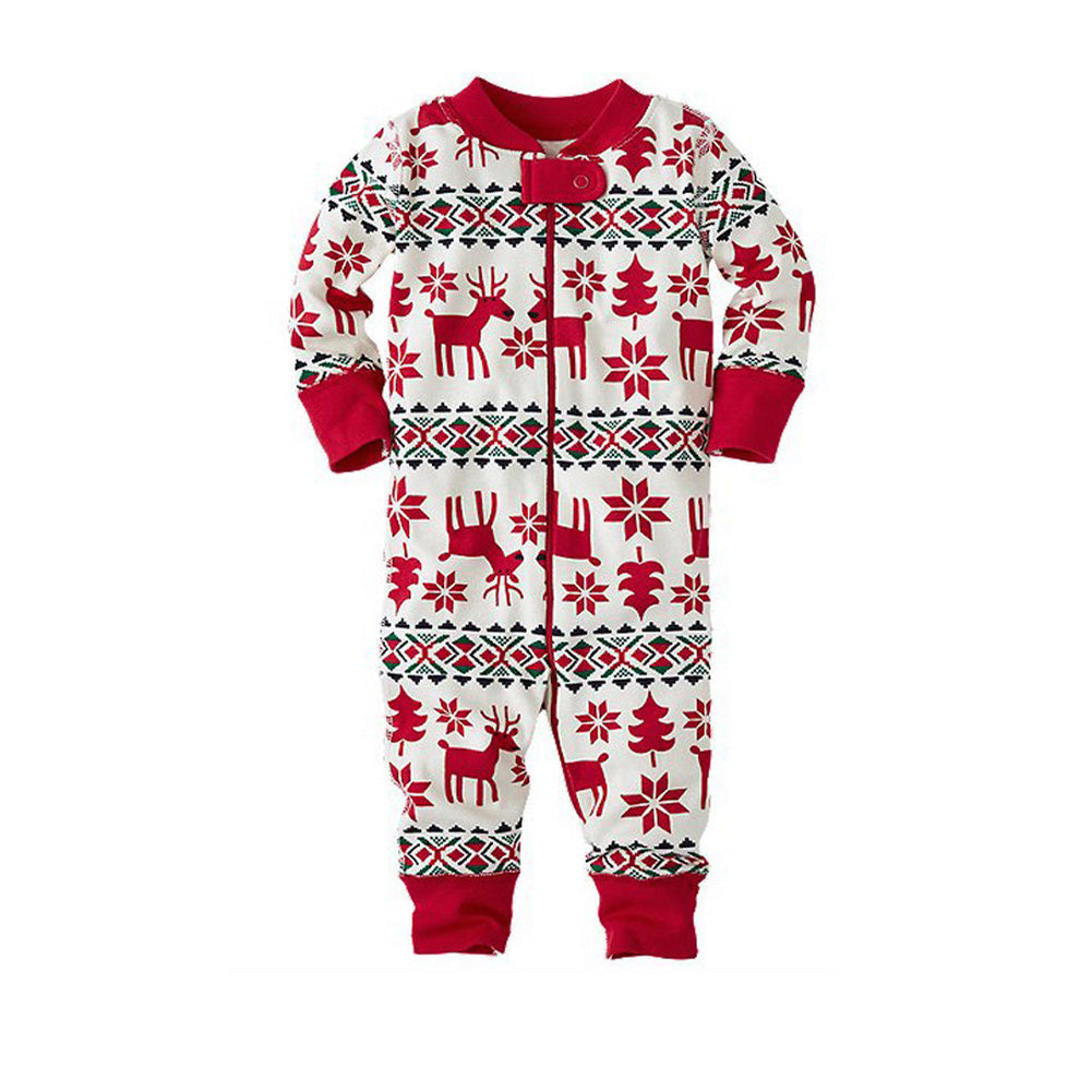 Family wearing matching red and cream reindeer print Christmas pajamas - view 14