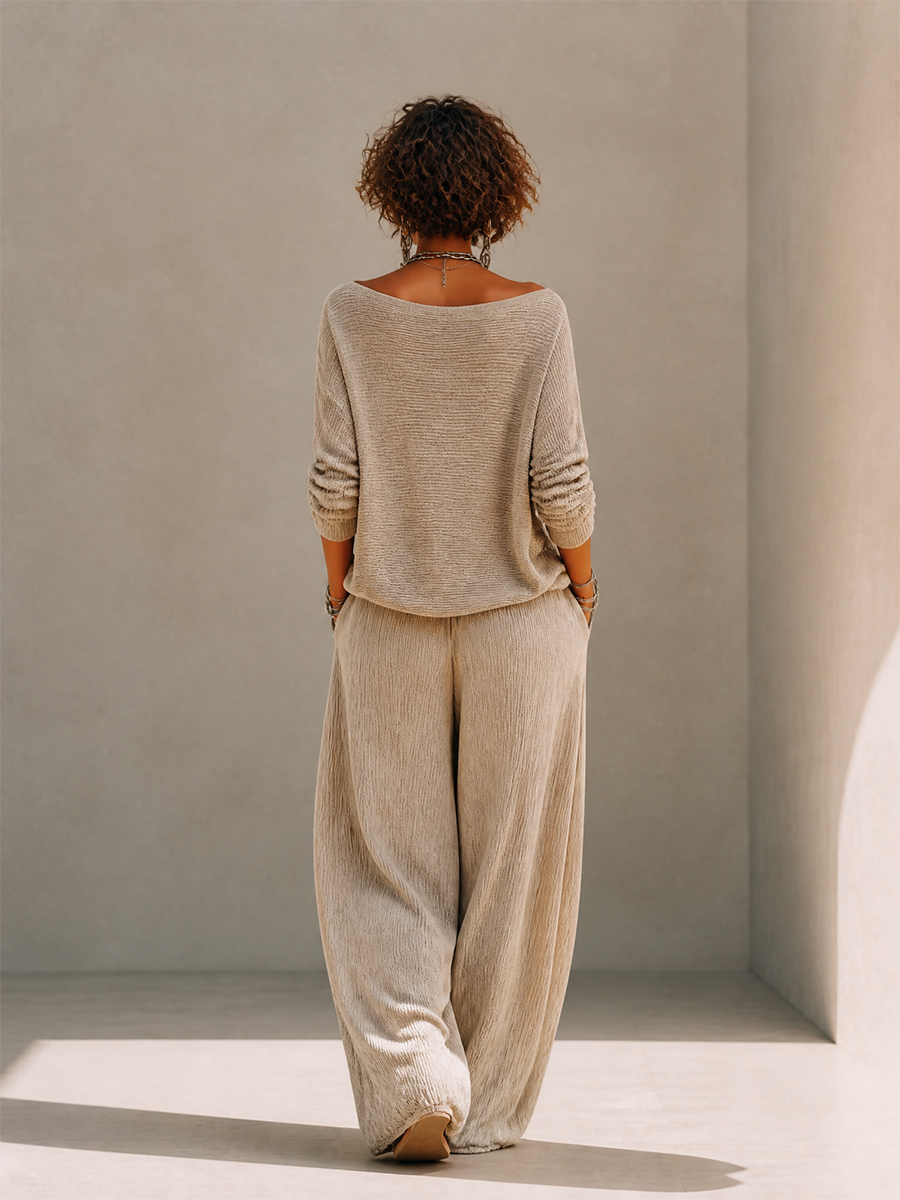 Woman wearing a khaki knit boat neck sweater and matching wide leg drawstring pants - view 3