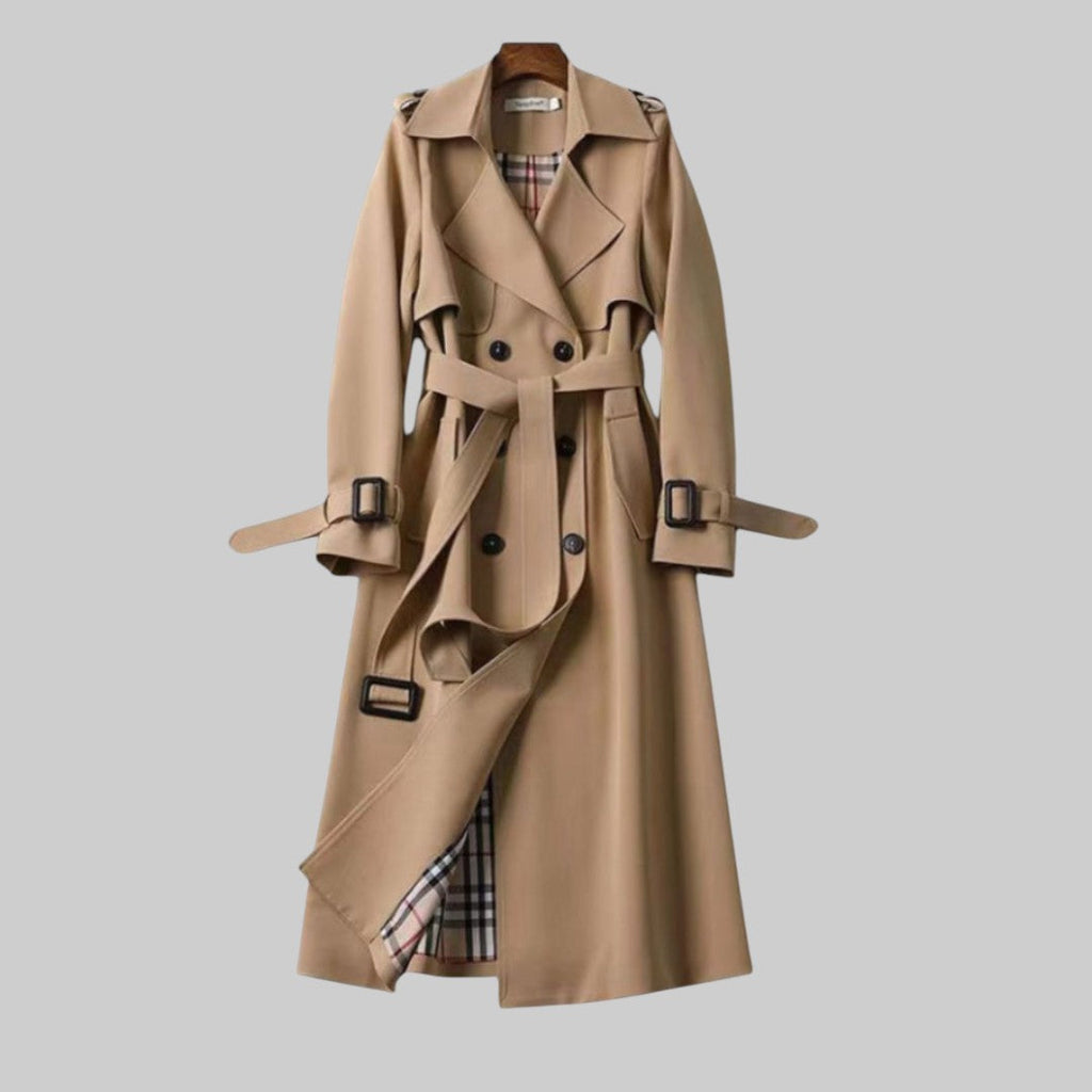 Long belted double breasted trench coat with notched lapels and buckled cuffs