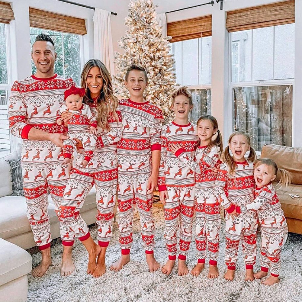 Matching family Christmas pajamas with red and white reindeer and snowflake print - view 13