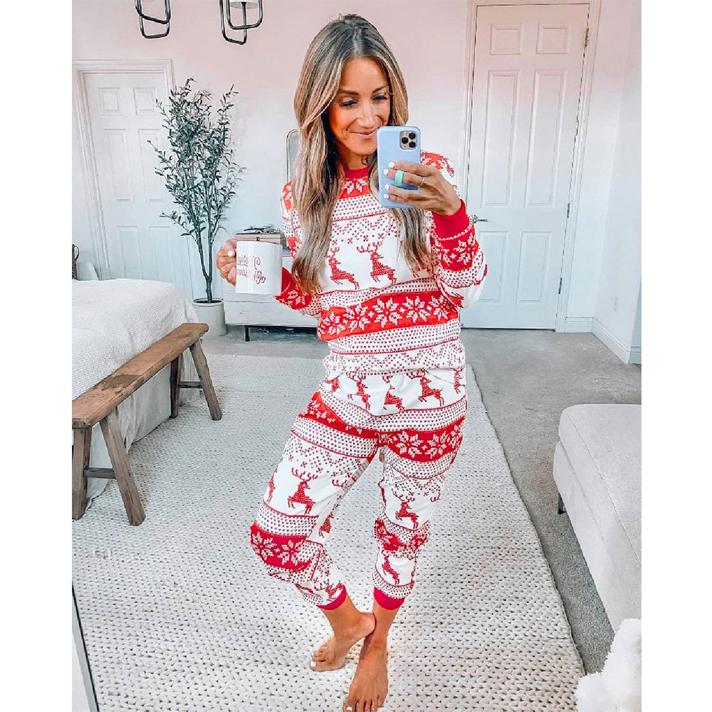 Matching family Christmas pajamas with red and white reindeer and snowflake print - view 4